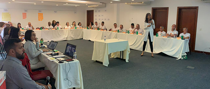 Equipe da Unimed Nova Iguaçu unida planejando os próximos passos da cooperativa